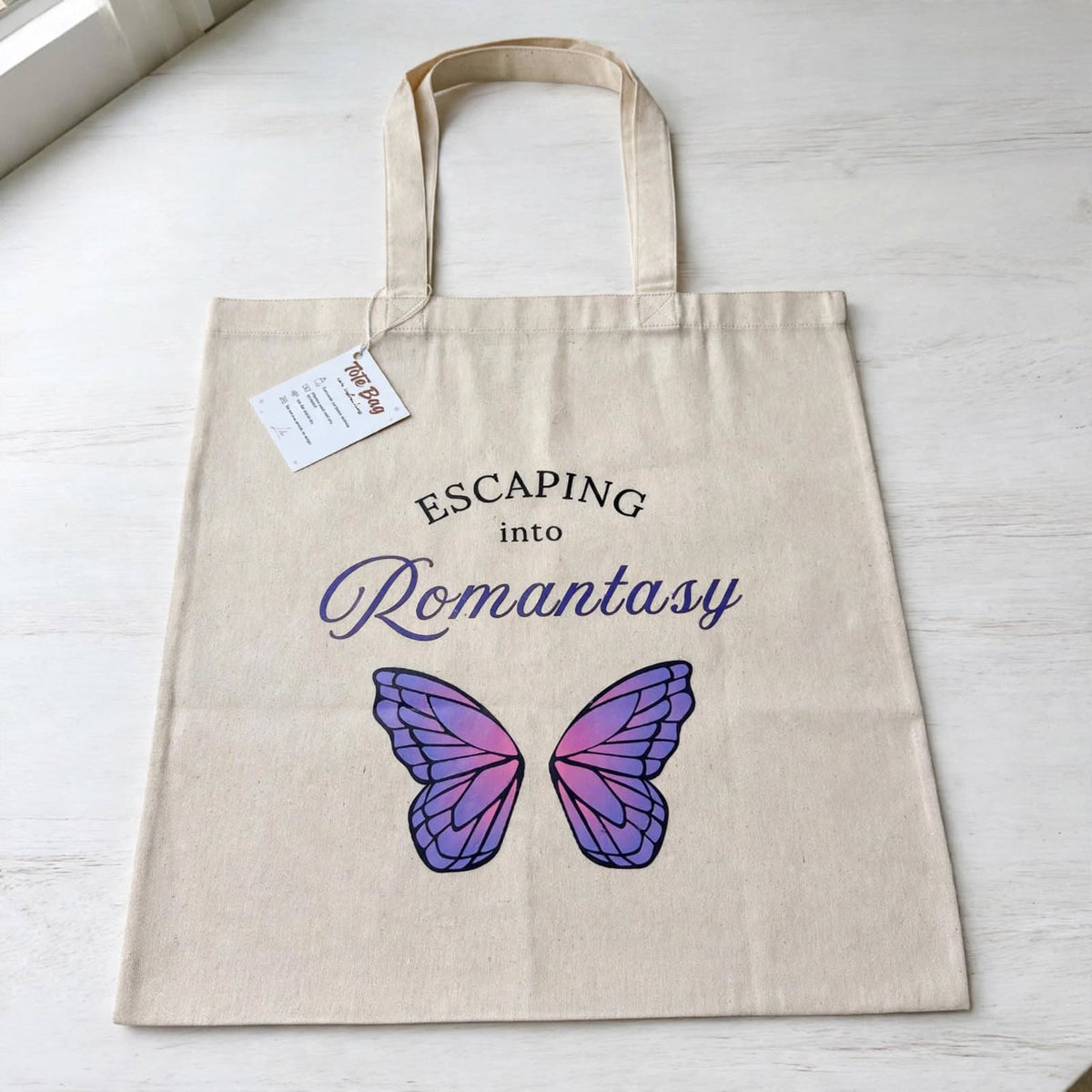 Escaping into Romantasy Canvas Tote bags